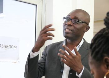 Wisconsin University lecturer Kofi Yeboah donates 700 basic school books to Miaso Krobo D/A Basic School in Eastern Region