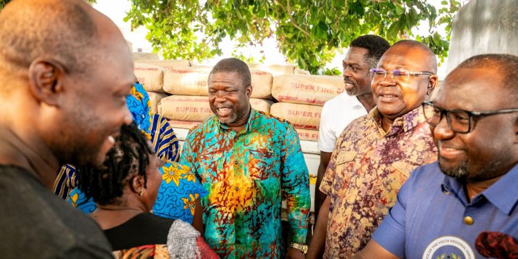 James Gunu presents 100 bags of cement to Ho-Hliha to fulfill NDC campaign promise